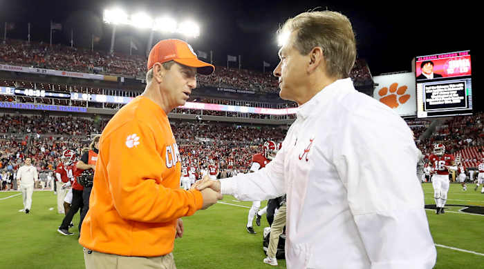 Dabo Swinney and Nick Saban embrace ahead of the College Football Playoff National Championship